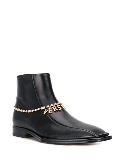 Shop Versace Quentin Ankle Leather Boots In Black