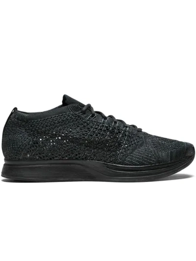 Shop Nike Flyknit Racer Sneakers In Black