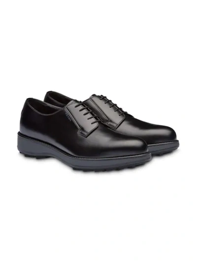 Shop Prada Brushed Leather Derby Shoes In Black
