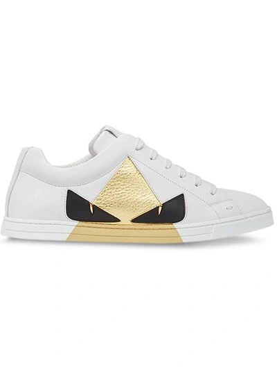 Shop Fendi Bag Bugs Low-top Sneakers In F14yr-ultrawhite+black+gol