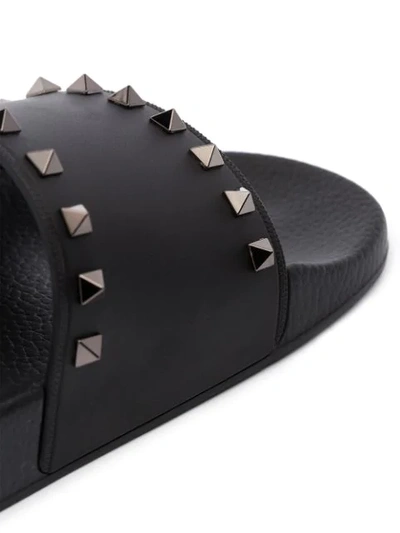 Shop Valentino Garavani Rockstud Slides In Black