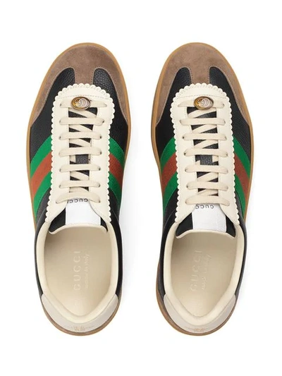 Shop Gucci Black Logo Embossed Leather Sneakers