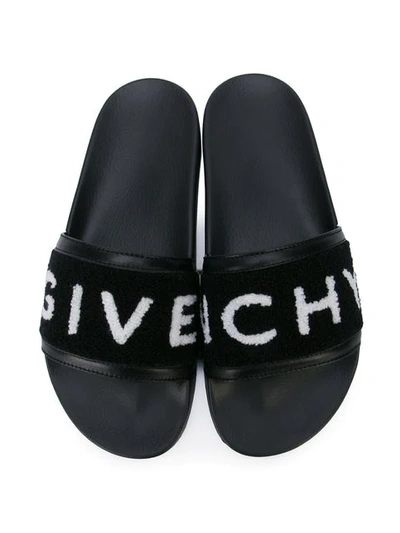 Shop Givenchy Pantoletten Mit Logo In Black