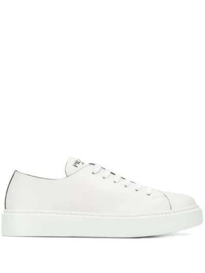 Shop Prada Flat Sole Sneakers - White