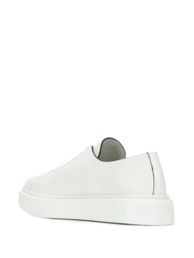 Shop Prada Flat Sole Sneakers - White