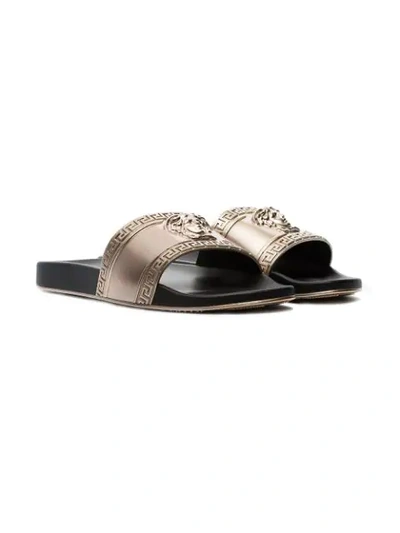 Shop Versace Gold-tone Medusa Embossed Slides In Metallic