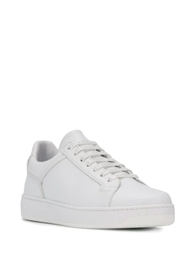 Shop Bottega Veneta Lace Up Sneakers In White