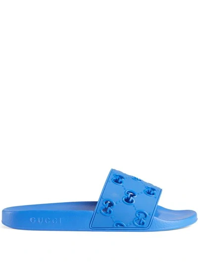 Shop Gucci Men's Rubber Gg Slide Sandal In Blue