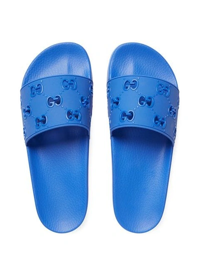 Shop Gucci Men's Rubber Gg Slide Sandal In Blue