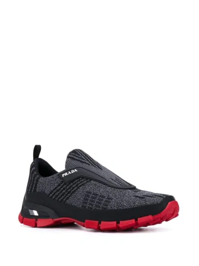 Shop Prada Crossection Knit Sneakers In F0n98 Nero + Rosso