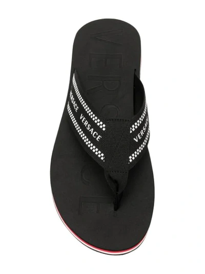 Shop Versace Logo Print Flip Flops In Black