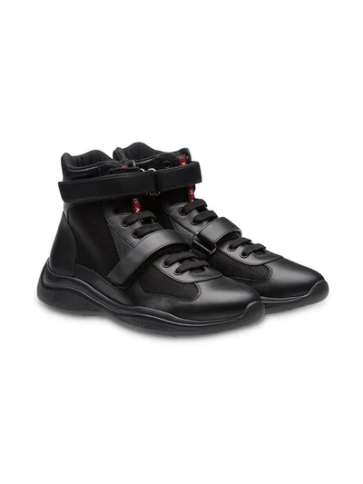 Shop Prada Leather And Fabric High-top Sneakers In Black