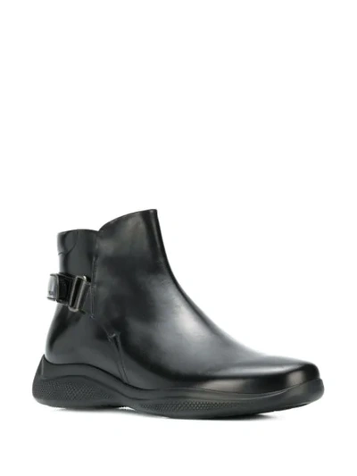 Shop Prada Backstrap Ankle Boots In F0002 Nero