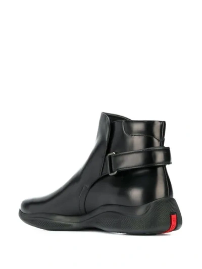 Shop Prada Backstrap Ankle Boots In F0002 Nero