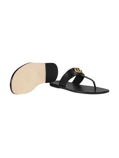 Shop Gucci Leather Thong Sandal With Double G In Black