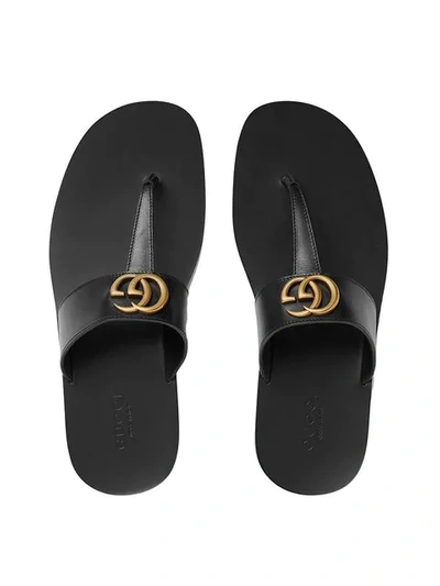 Shop Gucci Leather Thong Sandal With Double G In Black