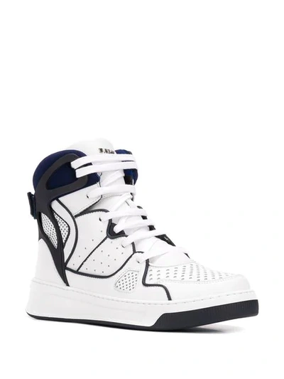 Shop Balmain Lace-up Hi-top Sneakers In White