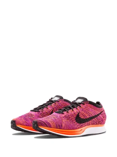 Shop Nike Flyknit Racer Sneakers In Pink