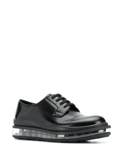 Shop Prada Transparent Sole Derby Shoes In Black