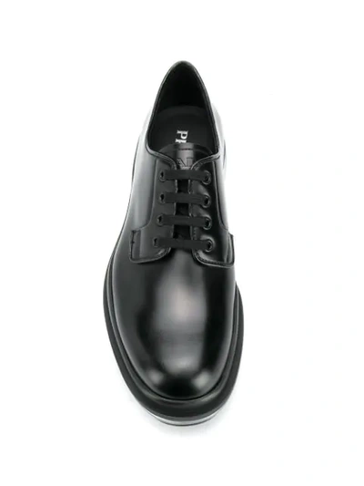 Shop Prada Transparent Sole Derby Shoes In Black