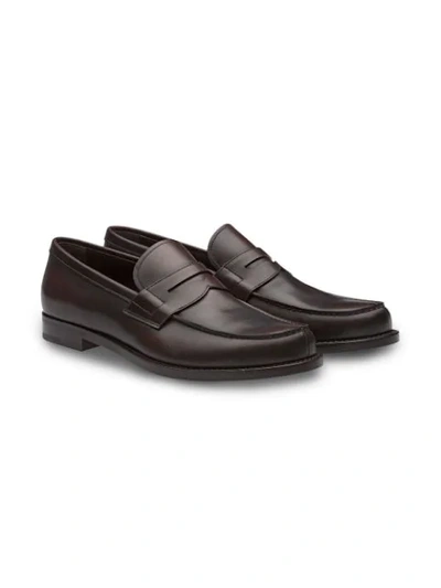 Shop Prada Leather Loafers In Brown