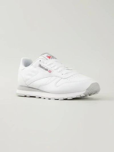 Shop Reebok 'classic' Sneakers - White
