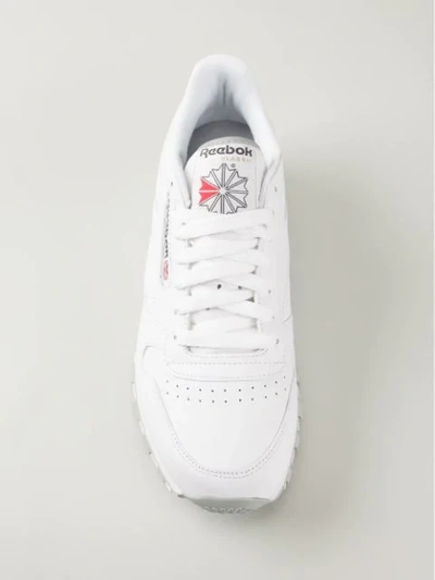 Shop Reebok 'classic' Sneakers - White