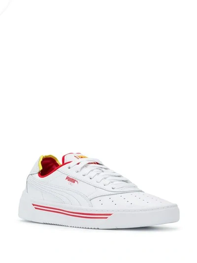 Shop Puma Low Top Sneakers In White