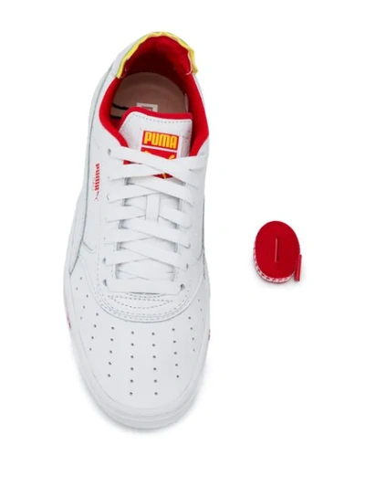 Shop Puma Low Top Sneakers In White