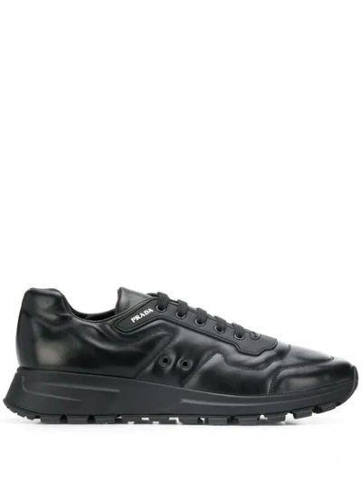 Shop Prada Low Lace-up Sneakers In F0002 Black