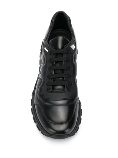 Shop Prada Low Lace-up Sneakers In F0002 Black