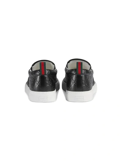 Shop Gucci Signature Slip-on Sneakers In Black