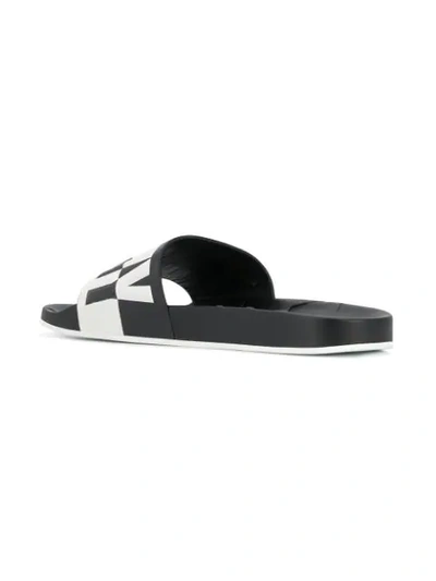 Shop Jimmy Choo Rey Sandals In Black