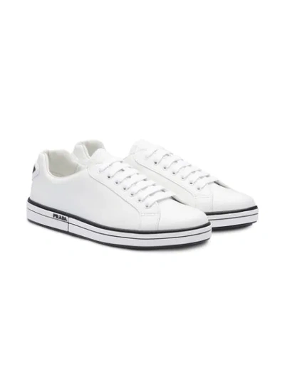 Shop Prada Leather Sneakers In F0009 White