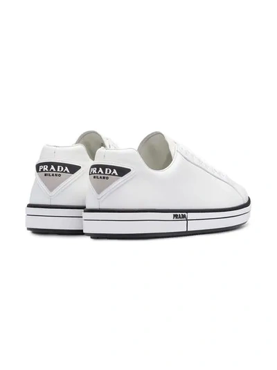 Shop Prada Leather Sneakers In F0009 White