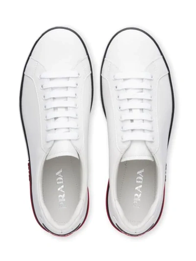 Shop Prada Leather Sneakers In White