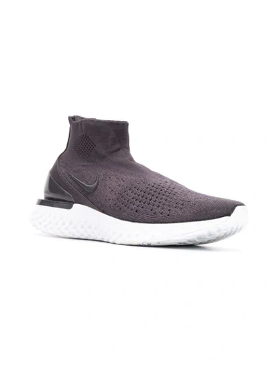 Shop Nike Rise React Flyknit Sneakers In Grey