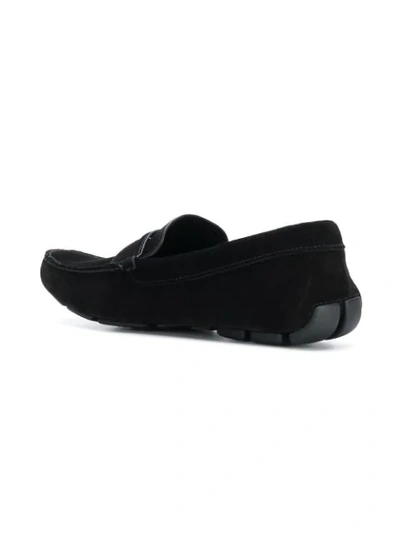 Shop Prada Classic Saffiano Loafers In Black