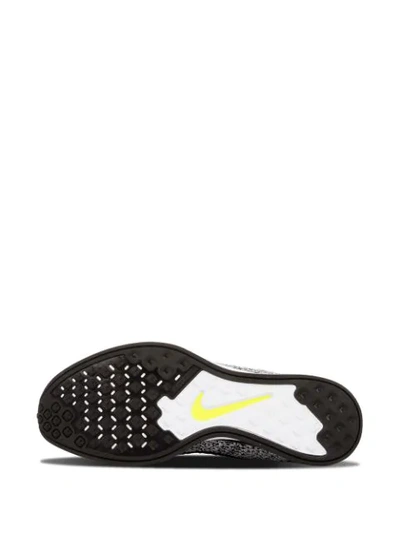 Shop Nike Flyknit Racer Sneakers In White