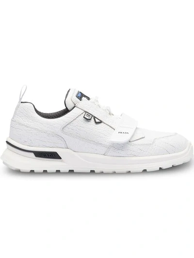 Shop Prada Crepe-effect Sneakers In White