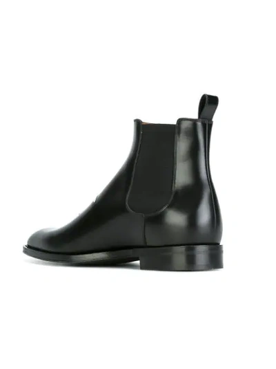 Shop Givenchy Star Patch Ankle Boots - Black