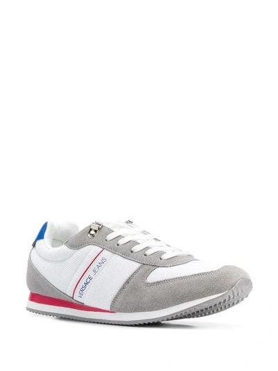 Shop Versace Jeans Low Top Logo Sneakers In White