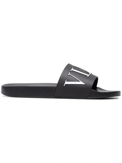 Shop Valentino Garavani Vltn Slides In Black