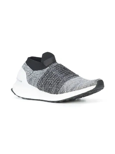 Shop Adidas Originals Ultraboost Laceless Sneakers In White/black