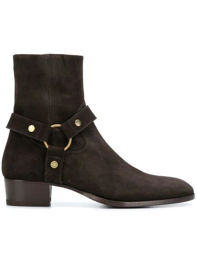 Shop Saint Laurent Wyatt Harness Boots In Brown