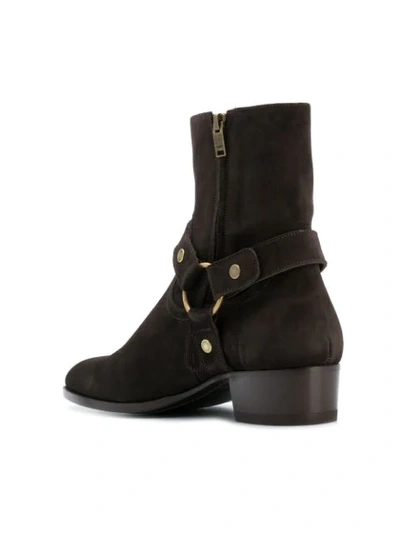 Shop Saint Laurent Wyatt Harness Boots In Brown