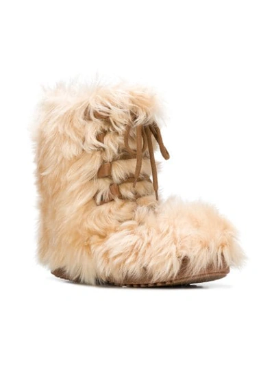 Shop Saint Laurent Furry Boots In Brown