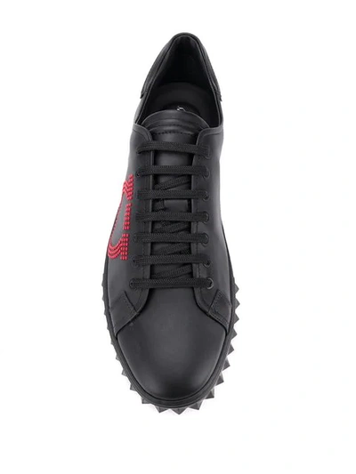 Shop Ferragamo Dotted Gancio Sneakers In Black