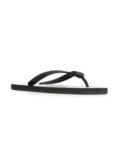 Shop Givenchy 'paris' Flip Flops In Black