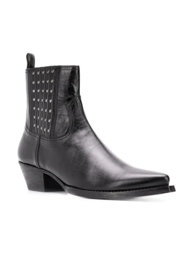 Shop Saint Laurent Studded Ankle Boots In Black